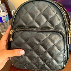 Black Faux Leather medium sized backpack